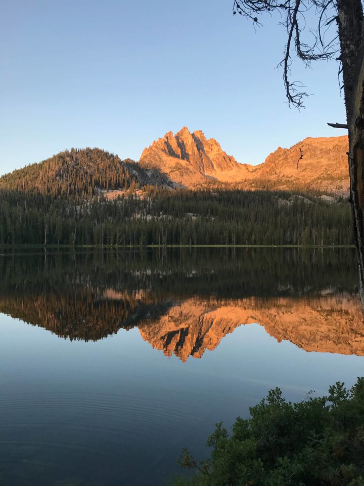 Sunrise on Mt. Heyburn reflected in bench Lake