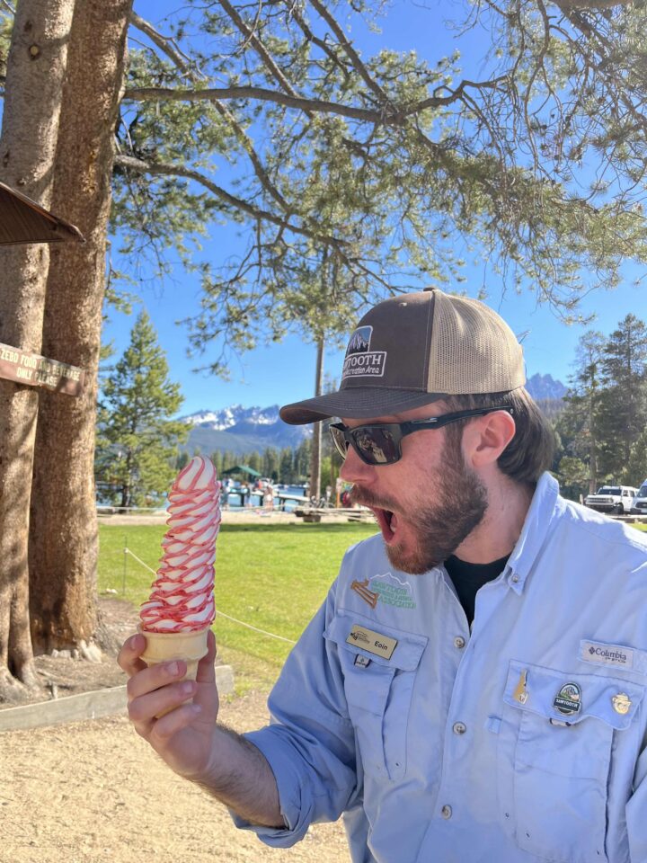 Staff eating swirl cone ice cream.
